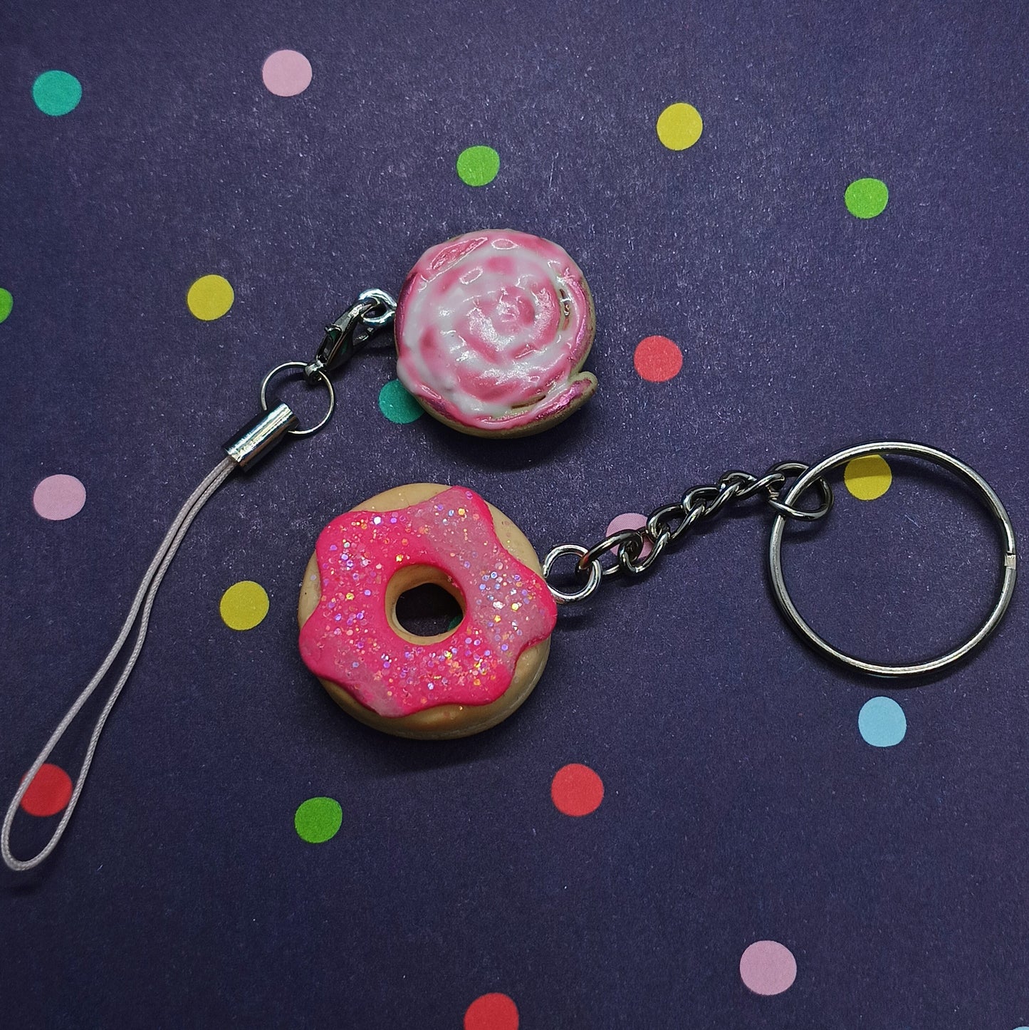 sparkle donut Keychain and pink chrome cinnamon roll bag charm