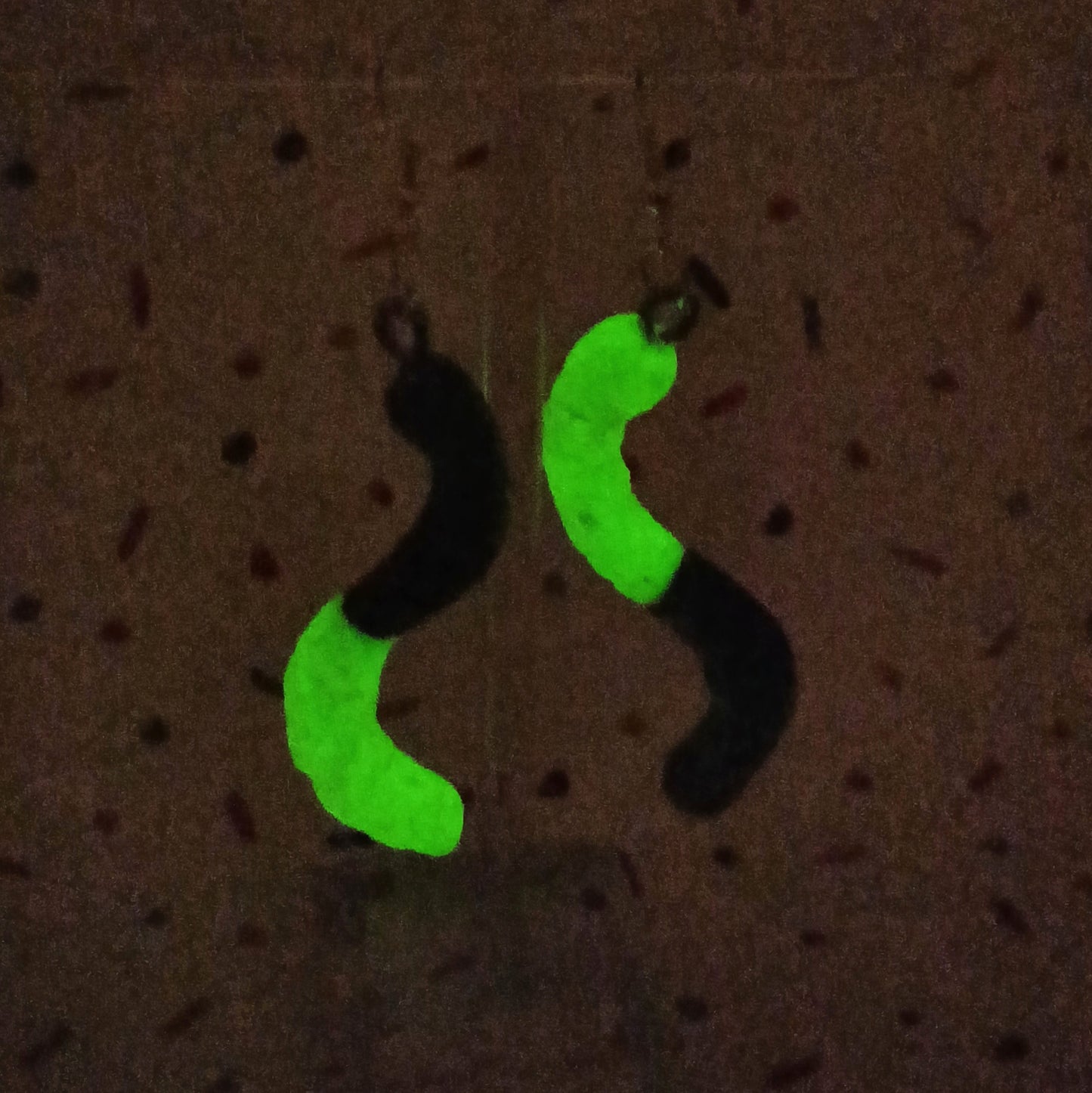 sour worm earrings that glow in the dark