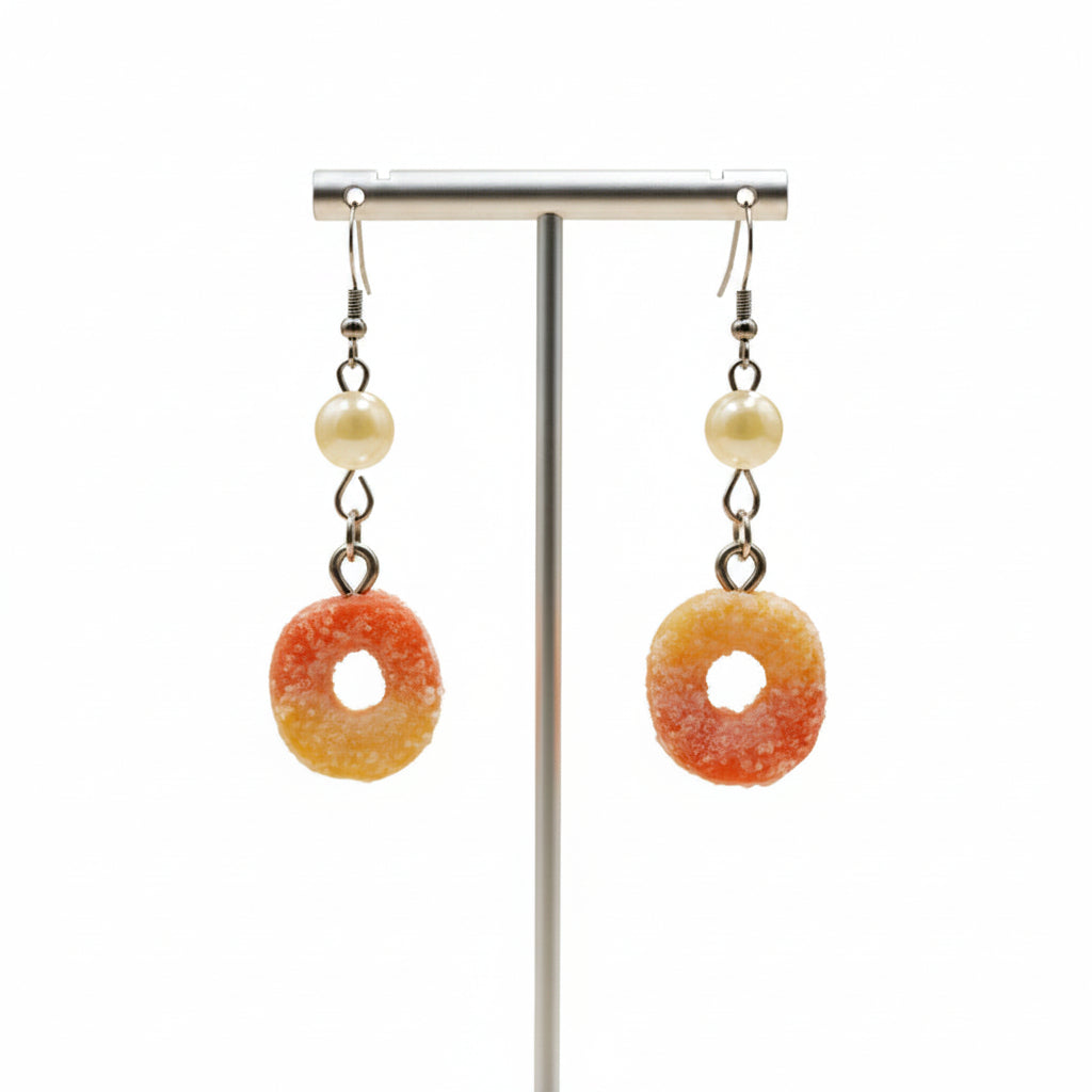 ring shaped earrings on a plain background