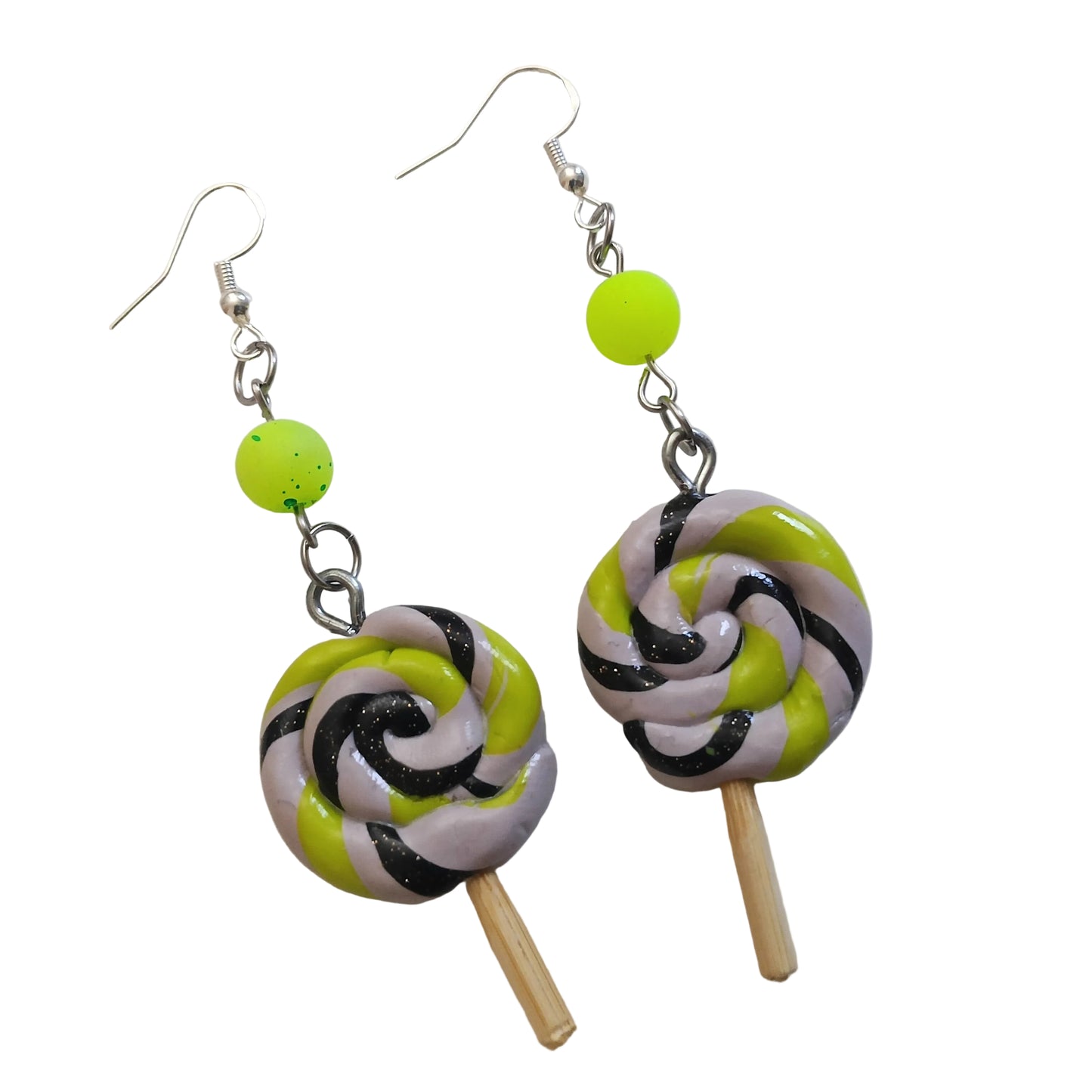 Lollipop-shaped earrings with green, black, and purple design on a white background