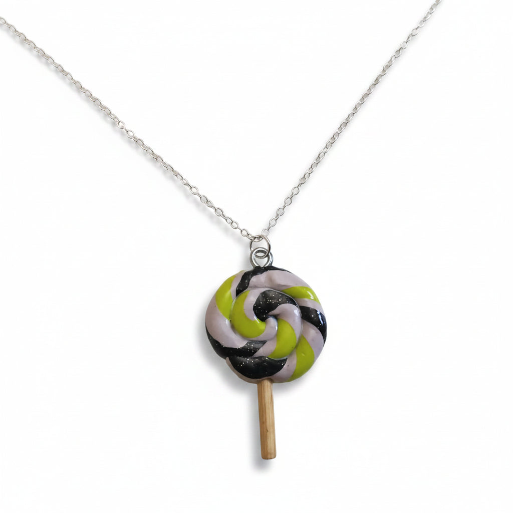 Lollipop-shaped pendant on a chain against a white background