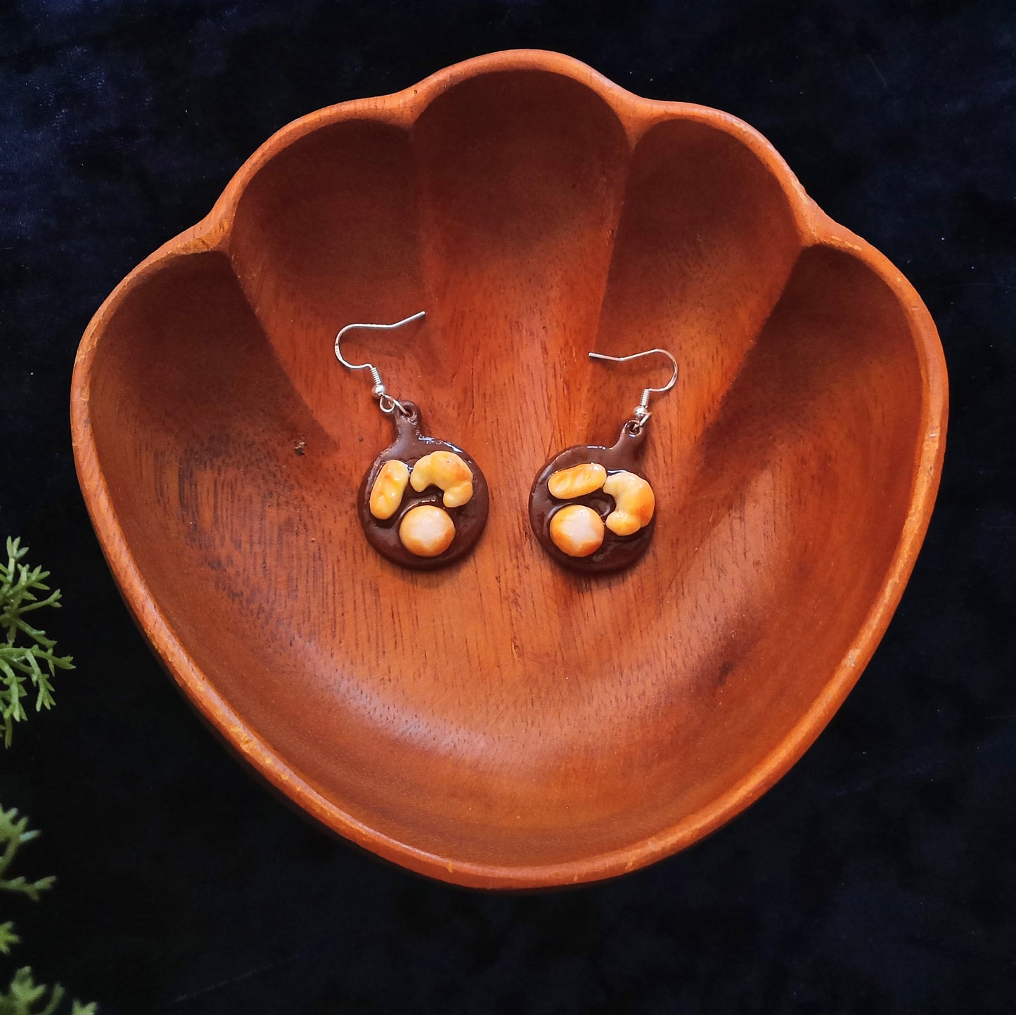 Handmade bread board dangle earrings with miniature baguette, croissant, and hot cross bun charms on sterling silver hooks