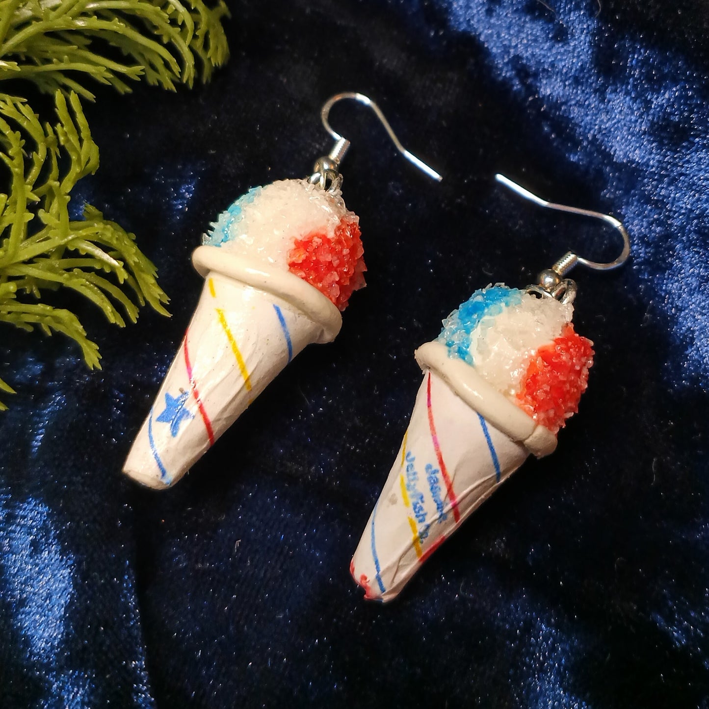 snow cone earrings on navy blue background