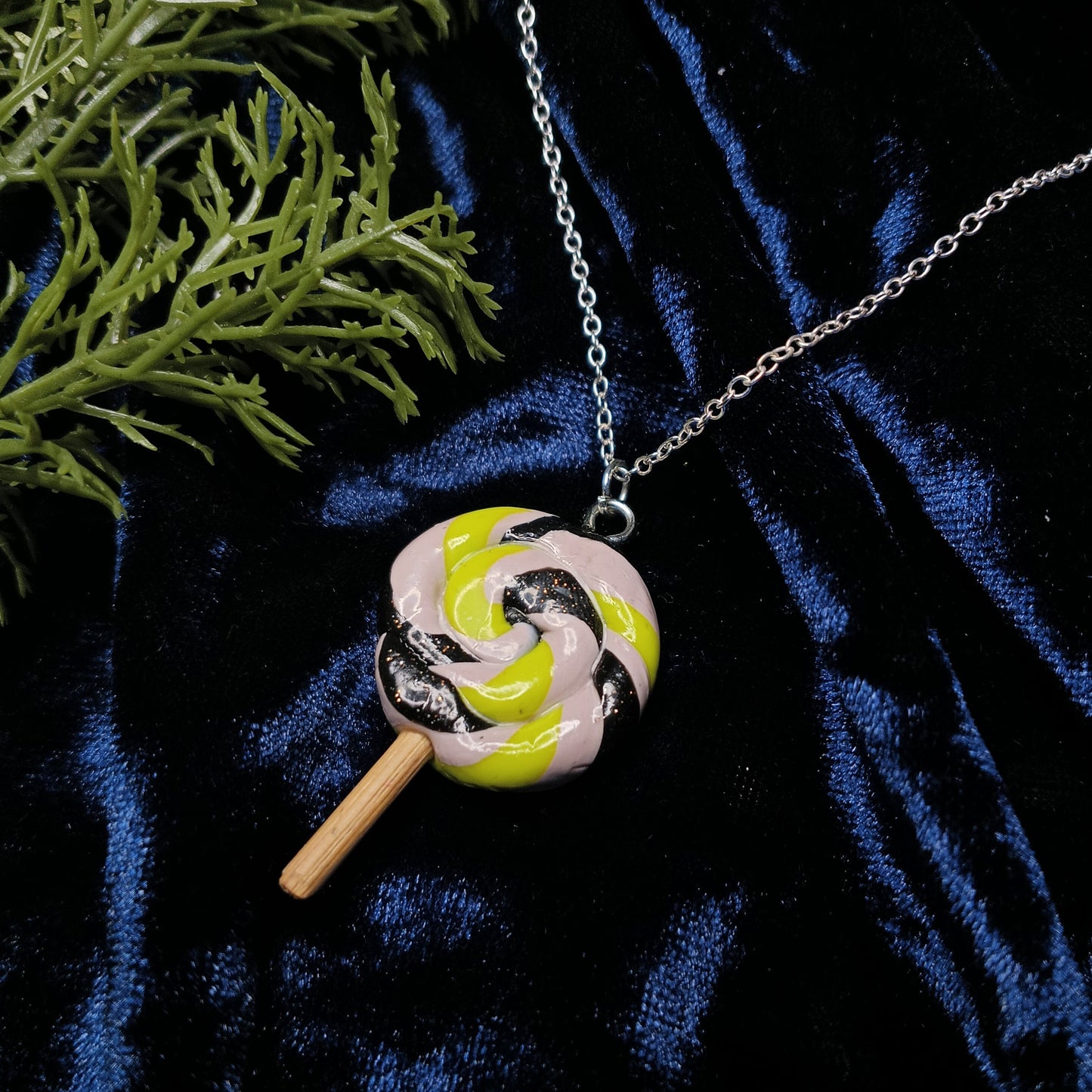 lollipop swirl necklace with dark background