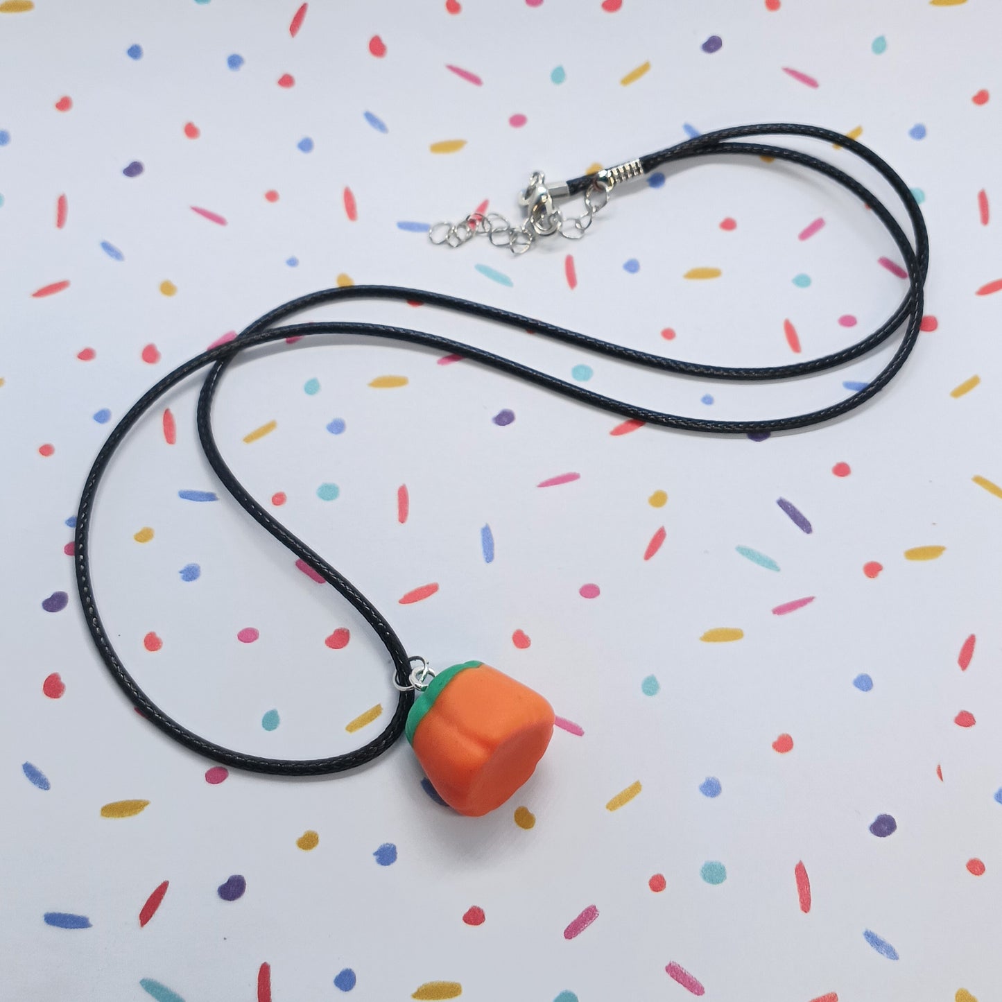 pumpkin candy corn necklace on black cable cord 