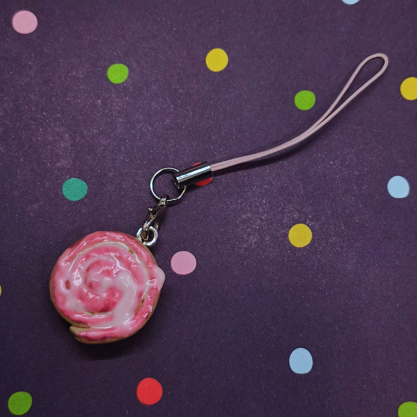 pink cinnamon roll bag charm