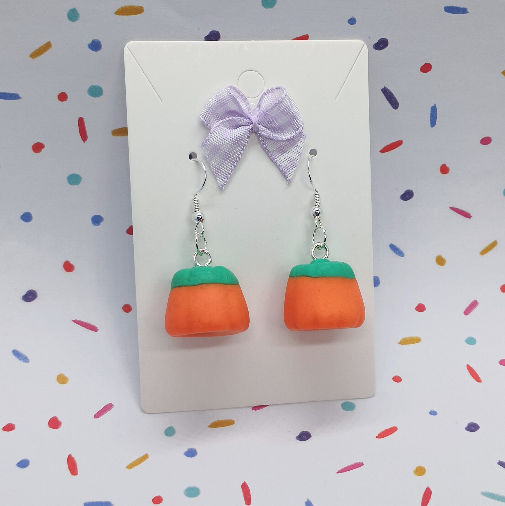 pumpkin candy corn earrings on earring card