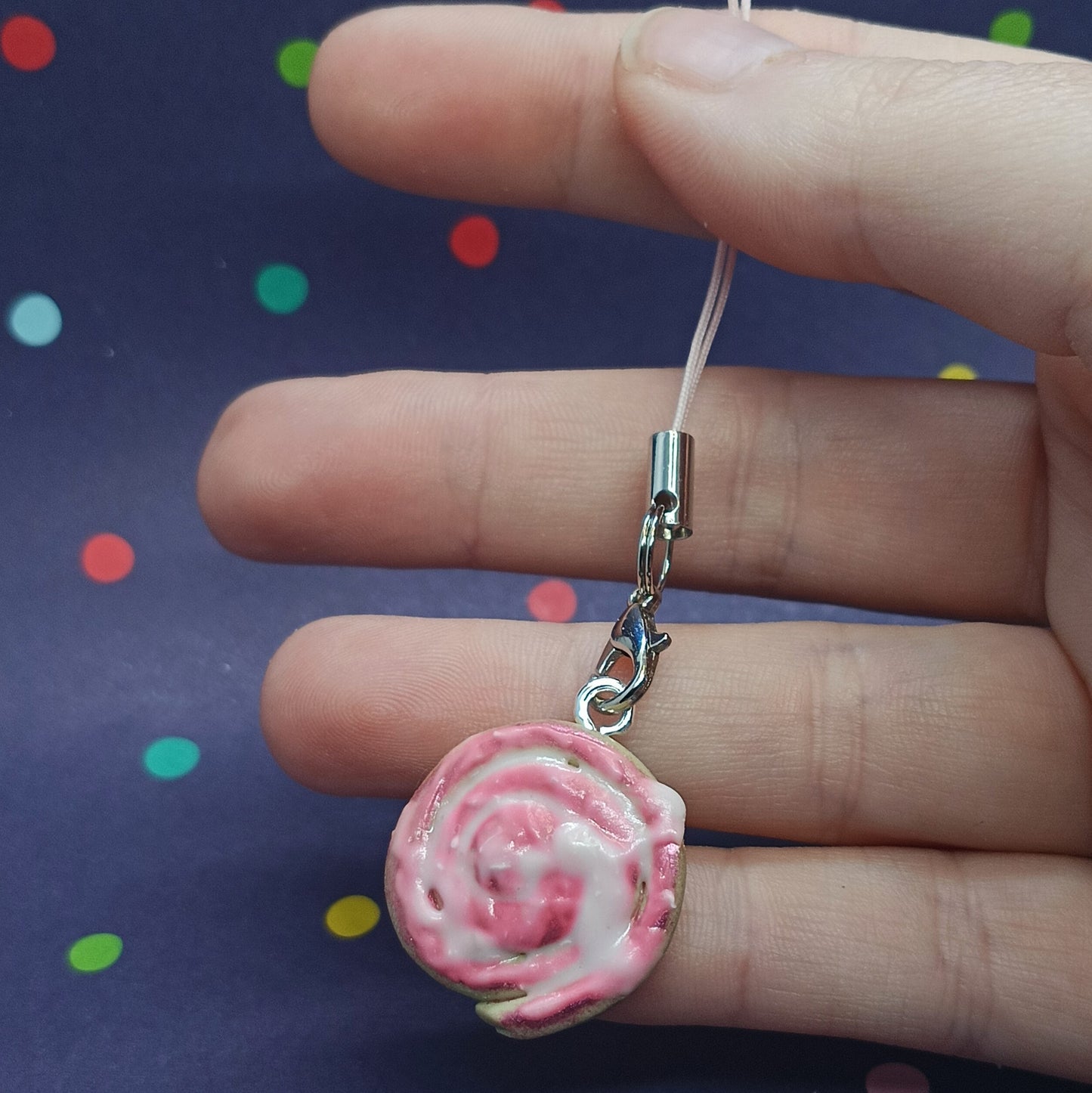 pink cinnamon roll bag charm